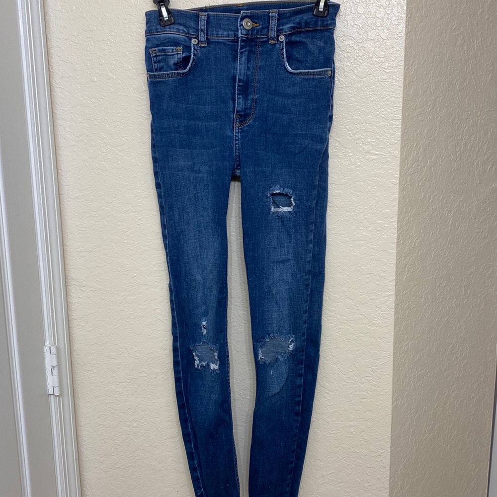 Ripped skinny blue jeans